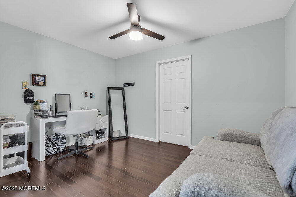 11 Cutter Court Cream Ridge, NJ 08514 - Photo 67 of 87 a living room with furniture and a wooden floor