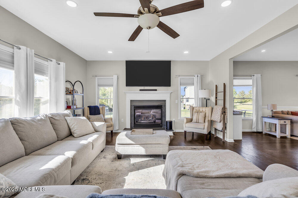 11 Cutter Court Cream Ridge, NJ 08514 - Photo 72 of 87 a living room with furniture fireplace and a flat screen tv