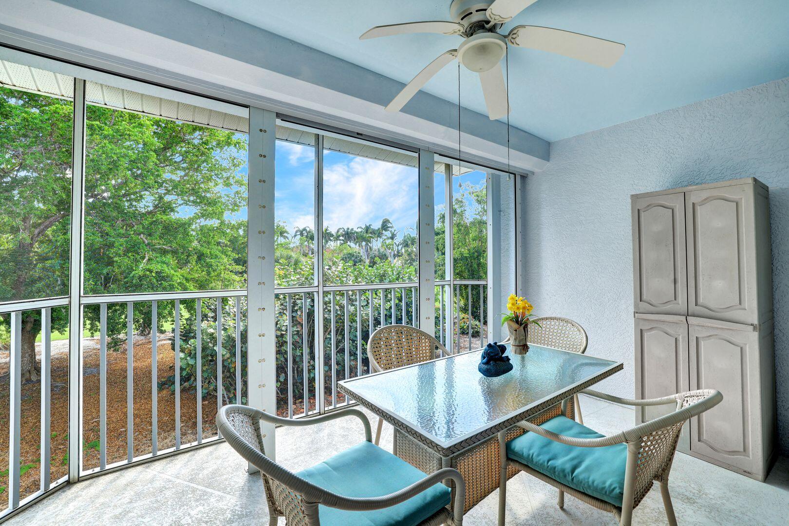1006 Mainsail Drive, Unit 224 Naples, FL 34114 - Photo 22 of 30 a view of a dining room with furniture window and outside view
