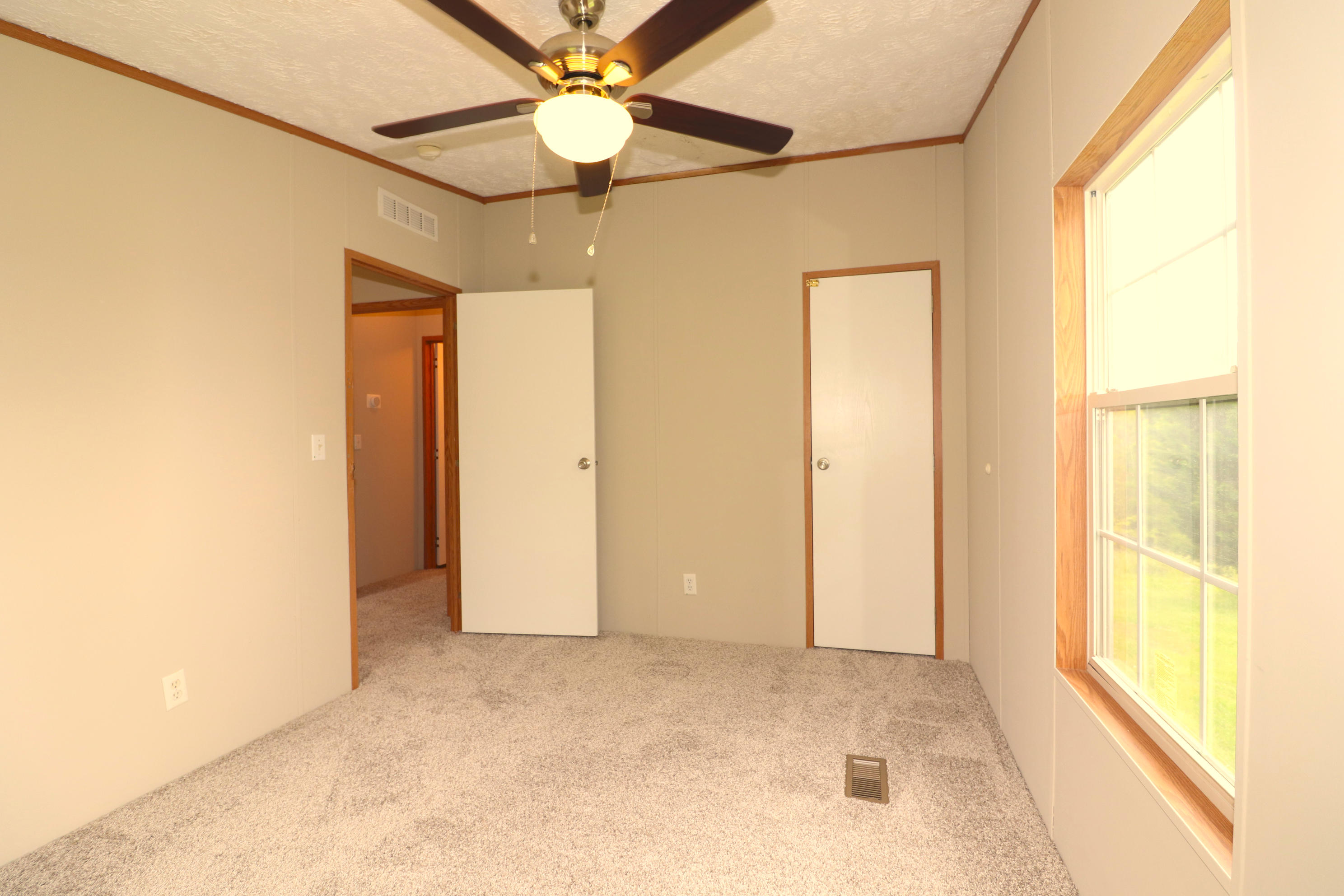615 Edwards Road Penhook, VA 24137 - Photo 12 of 16 a view of an empty room with a window