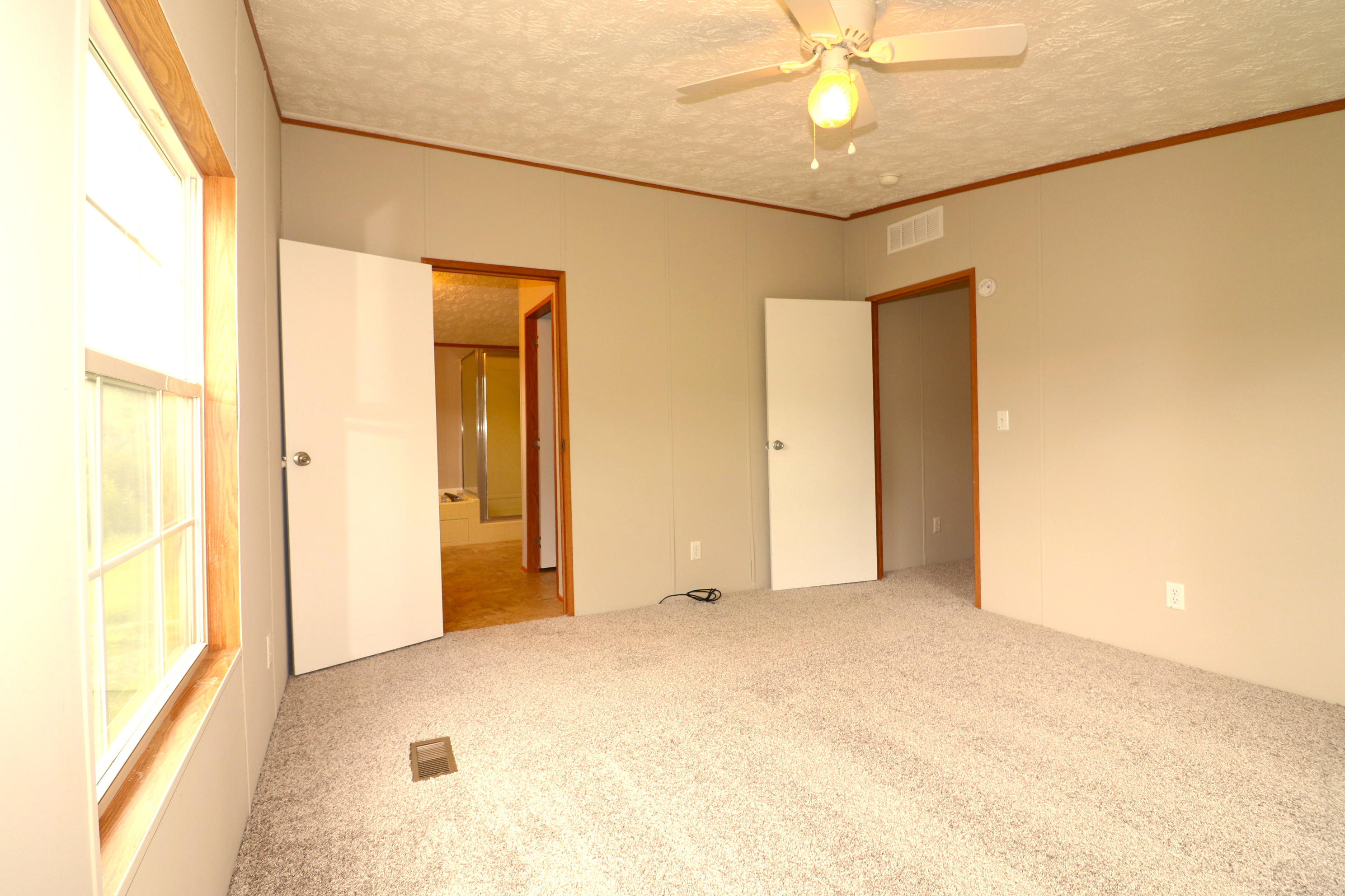 615 Edwards Road Penhook, VA 24137 - Photo 13 of 16 a view of an empty room with a window