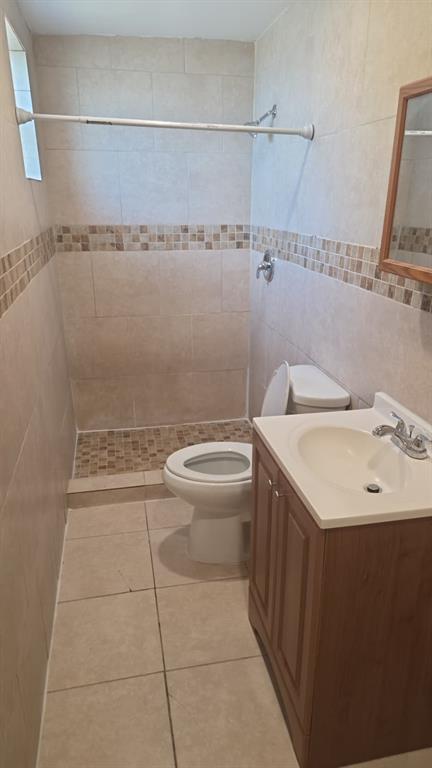 5241 Mayo Street Hollywood, FL 33021 - Photo 13 of 15 a bathroom with a sink a toilet and shower