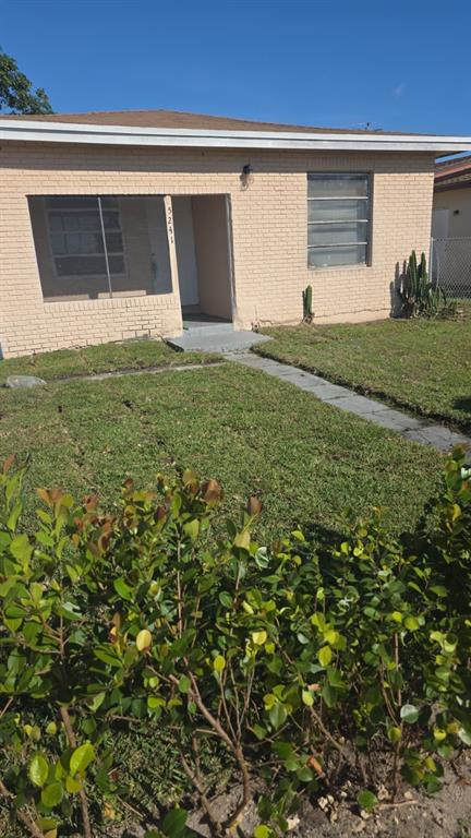 5241 Mayo Street Hollywood, FL 33021 - Photo 2 of 15 a view of backyard with garage