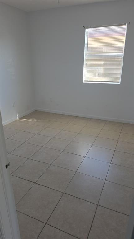 5241 Mayo Street Hollywood, FL 33021 - Photo 9 of 15 a view of a room that has a window in it
