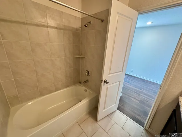 a bathroom with a bathtub