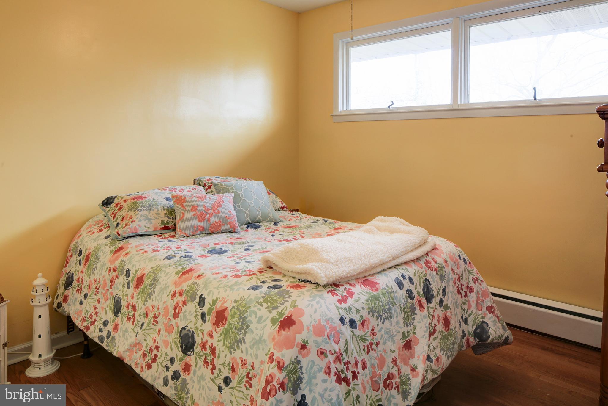 6107 Medora Road Linthicum, MD 21090 - Photo 14 of 31 Bedroom 2 with hardwood flooring