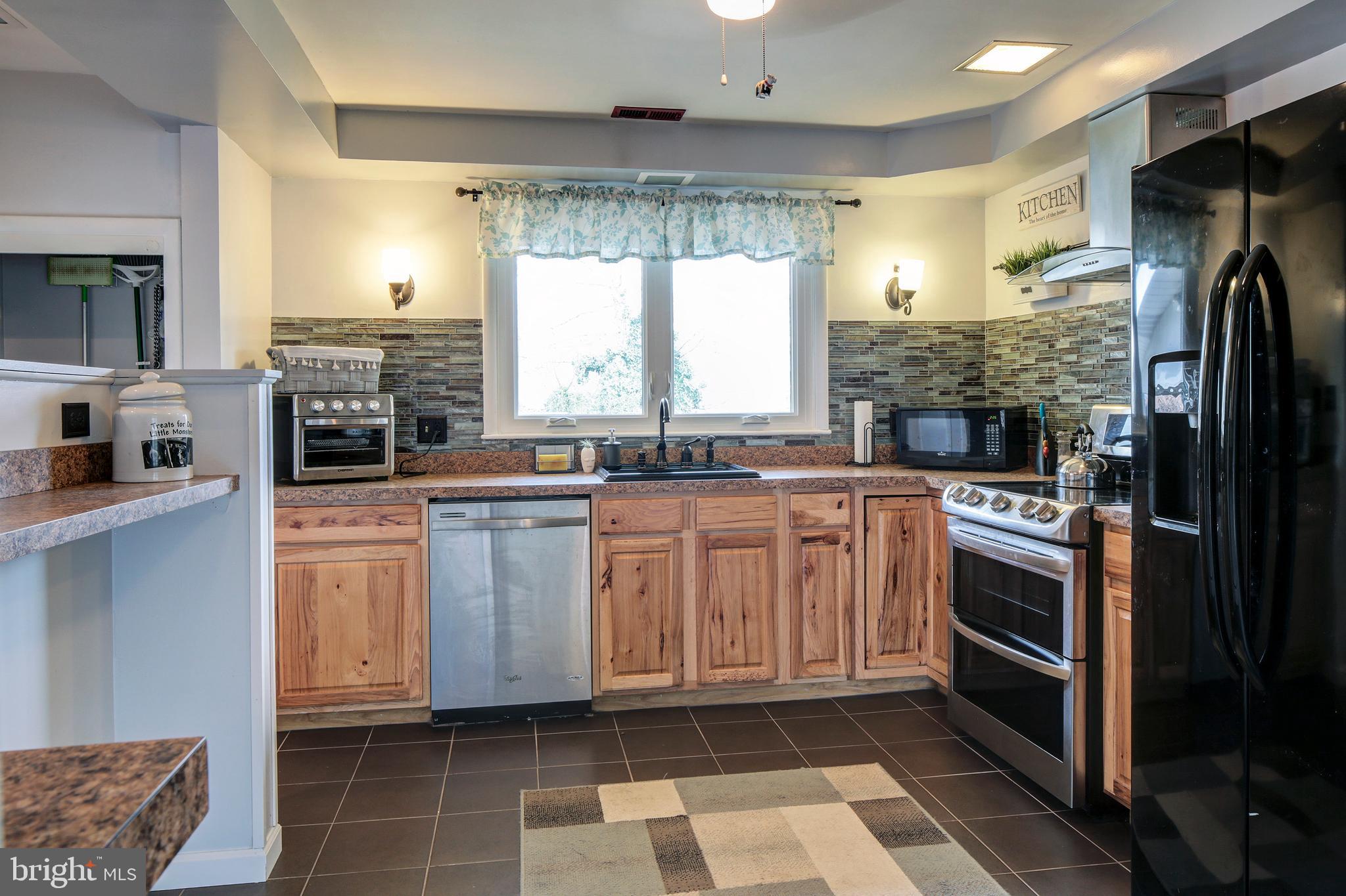6107 Medora Road Linthicum, MD 21090 - Photo 8 of 31 Updated kitchen w/oak cabs and newer appliances