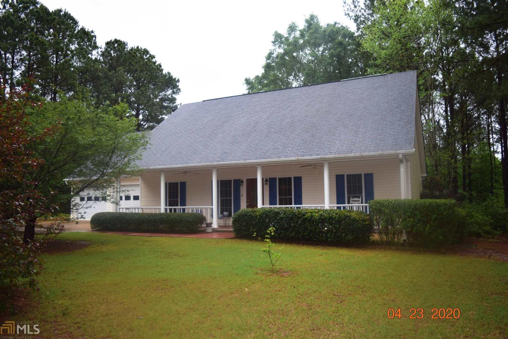 202 Planters Ridge Court LaGrange, GA 30240 - Photo 1 of 1 a front view of a house with a garden