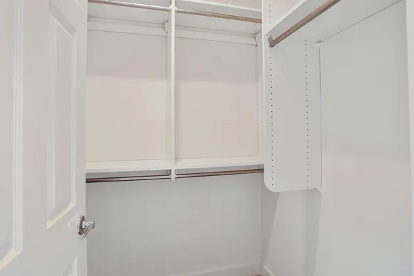 a view of a hallway with entryway