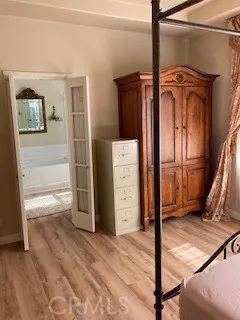 a view of front door and bedroom