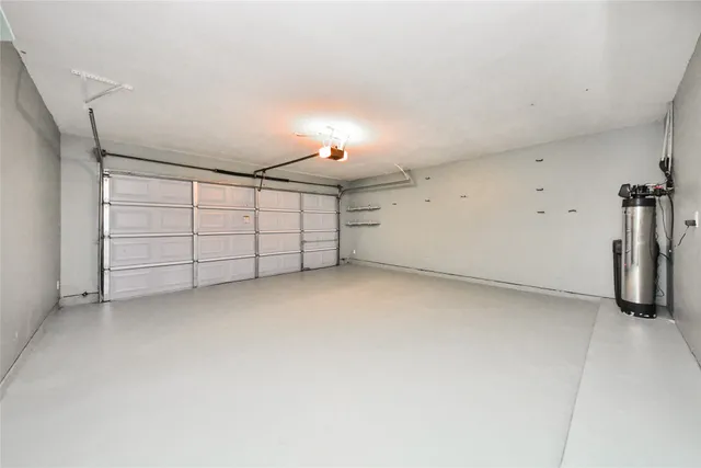 a view of a house with backyard and porch