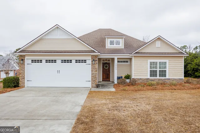 front view of a house with a yard