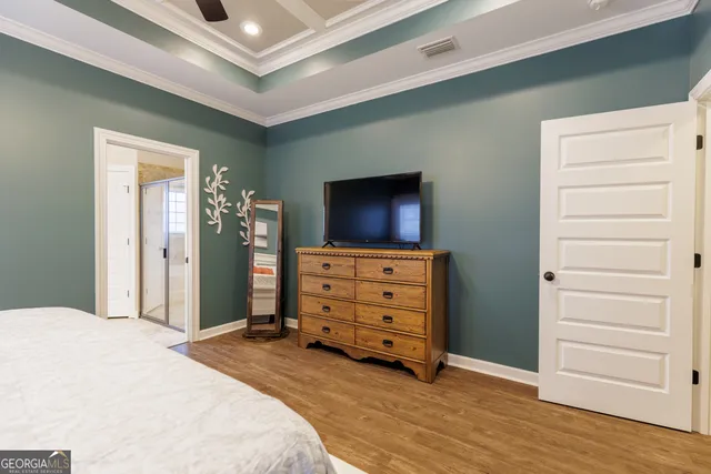 a bedroom with a bed and furniture