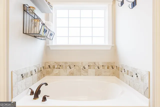 a bathroom with a bathtub