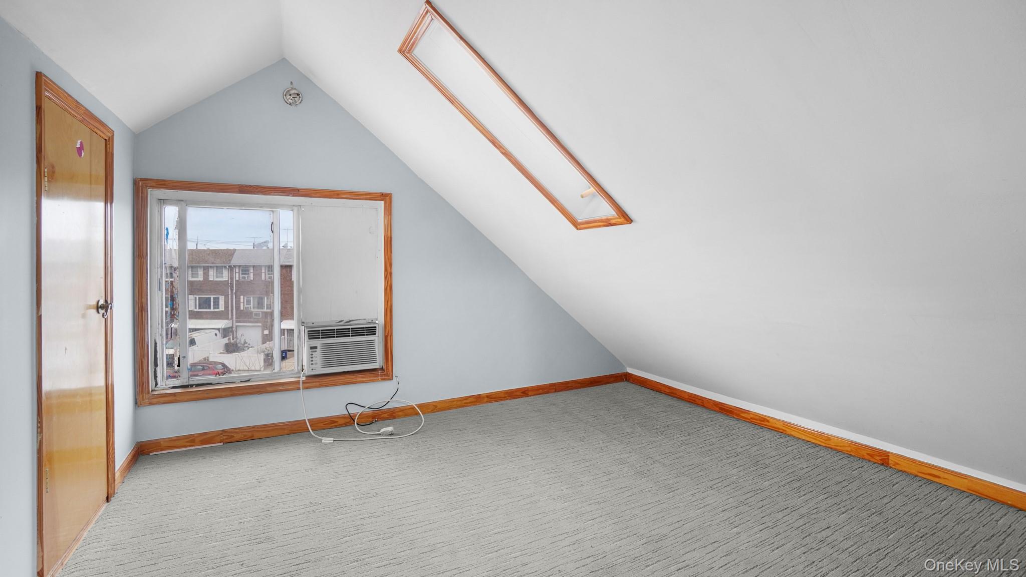 217-34 Hempstead Avenue Queens, NY 11429 - Photo 14 of 21 a view of an empty room with a window