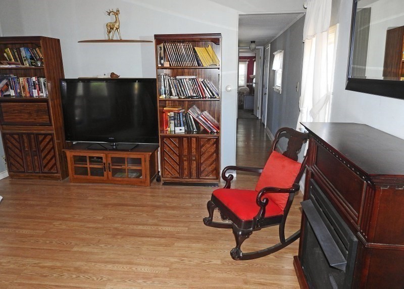 103 Castle Drive Wareham, MA 02576 - Photo 14 of 22 a living room with furniture and a flat screen tv