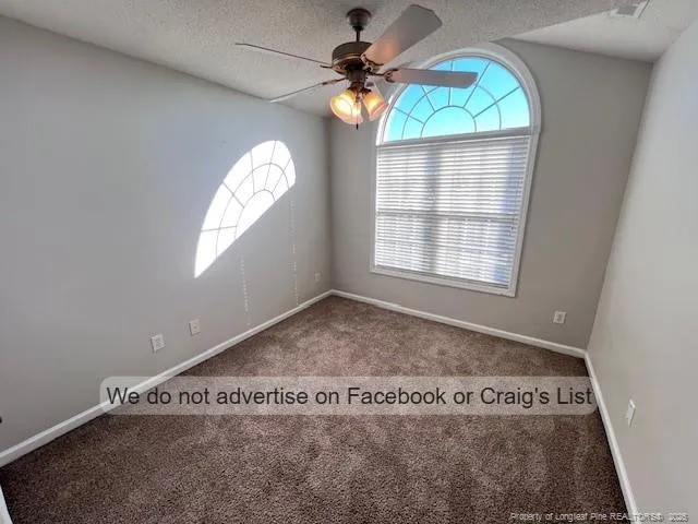 a view of a house with swimming pool outdoor seating
