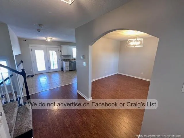 a view of a hallway with entryway