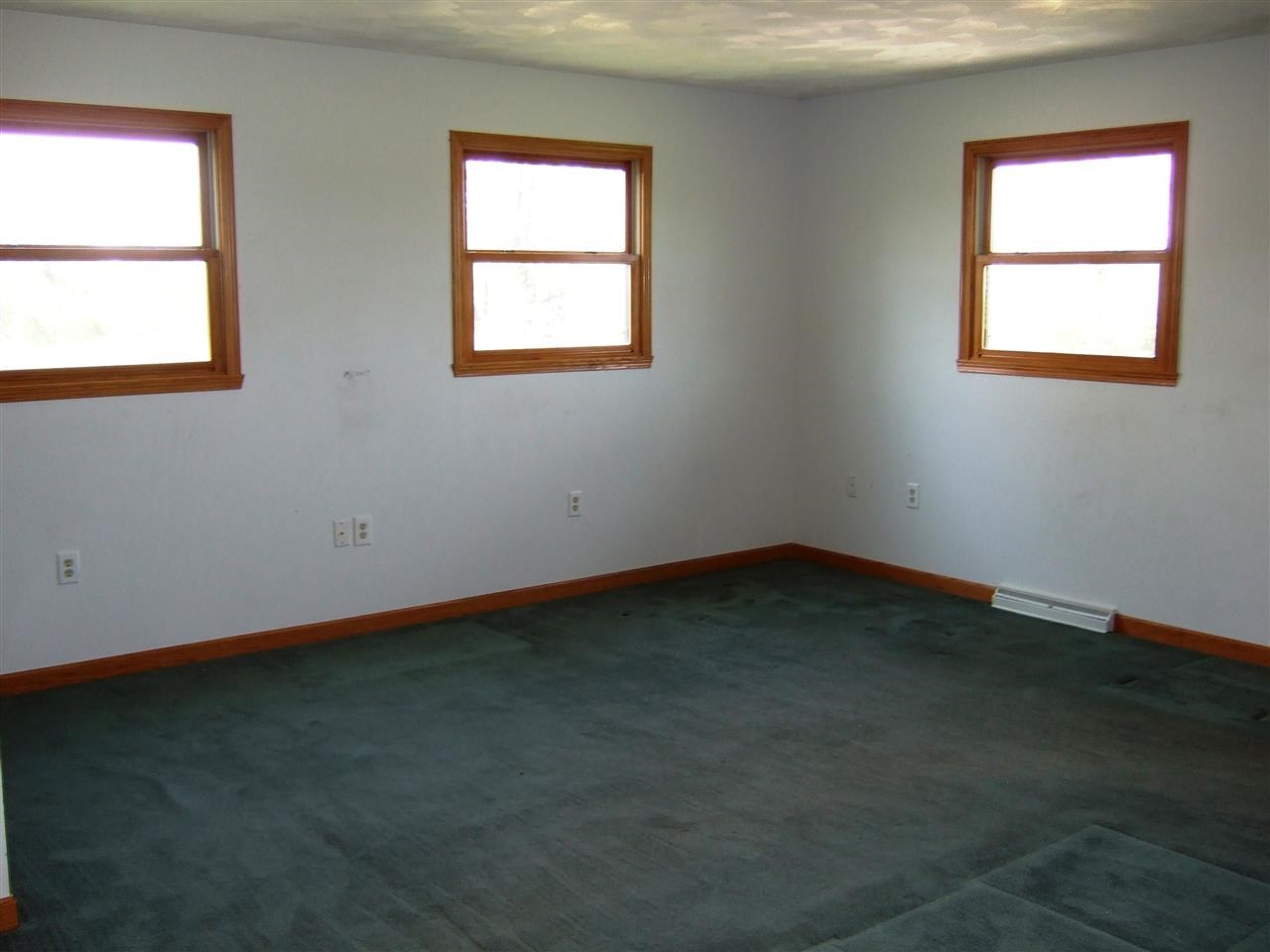 7836 Stephens Road Rockton, IL 61072 - Photo 8 of 14 an empty room with a window