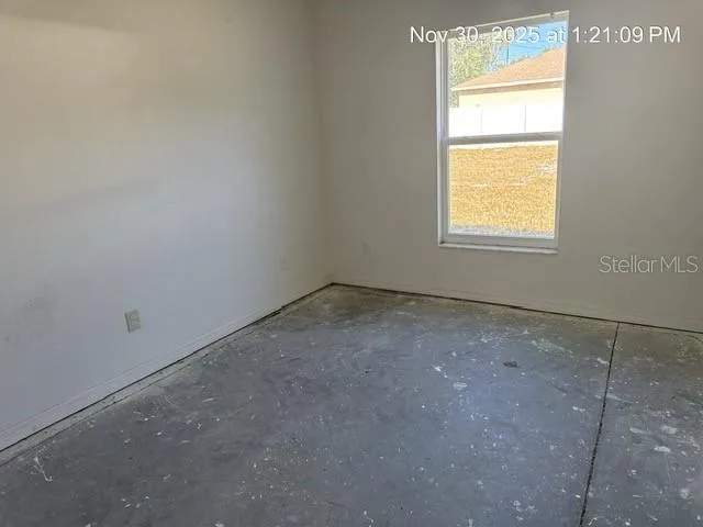 an empty room with a window