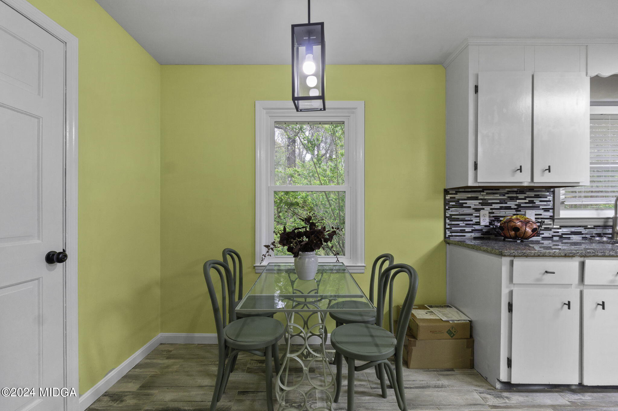 1299 Rainey Road Macon, GA 31220 - Photo 16 of 35 a dining room with furniture and window