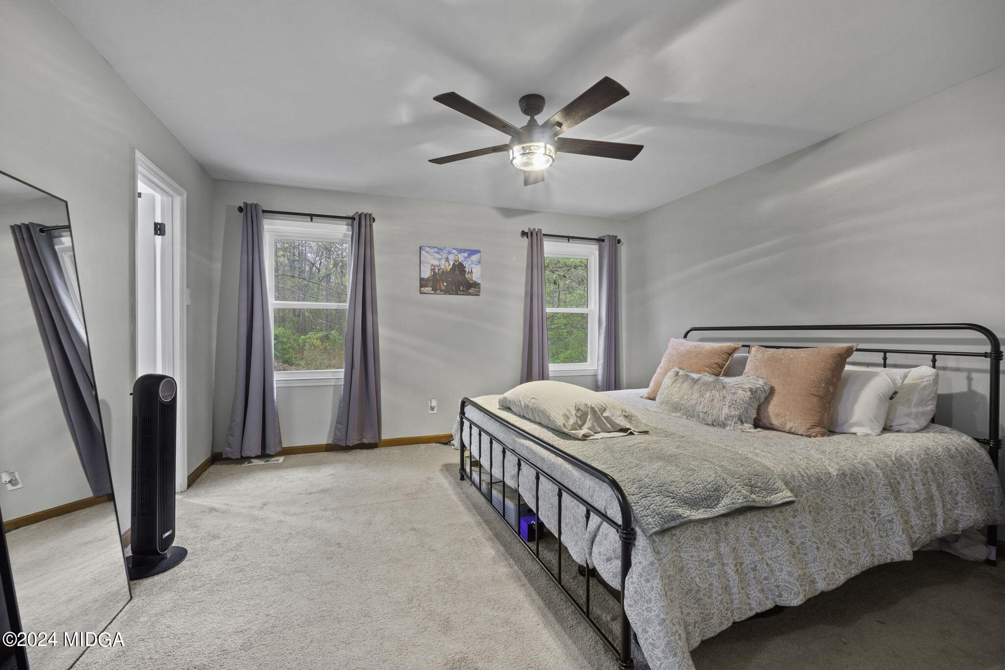 1299 Rainey Road Macon, GA 31220 - Photo 18 of 35 a bedroom with a bed and a window