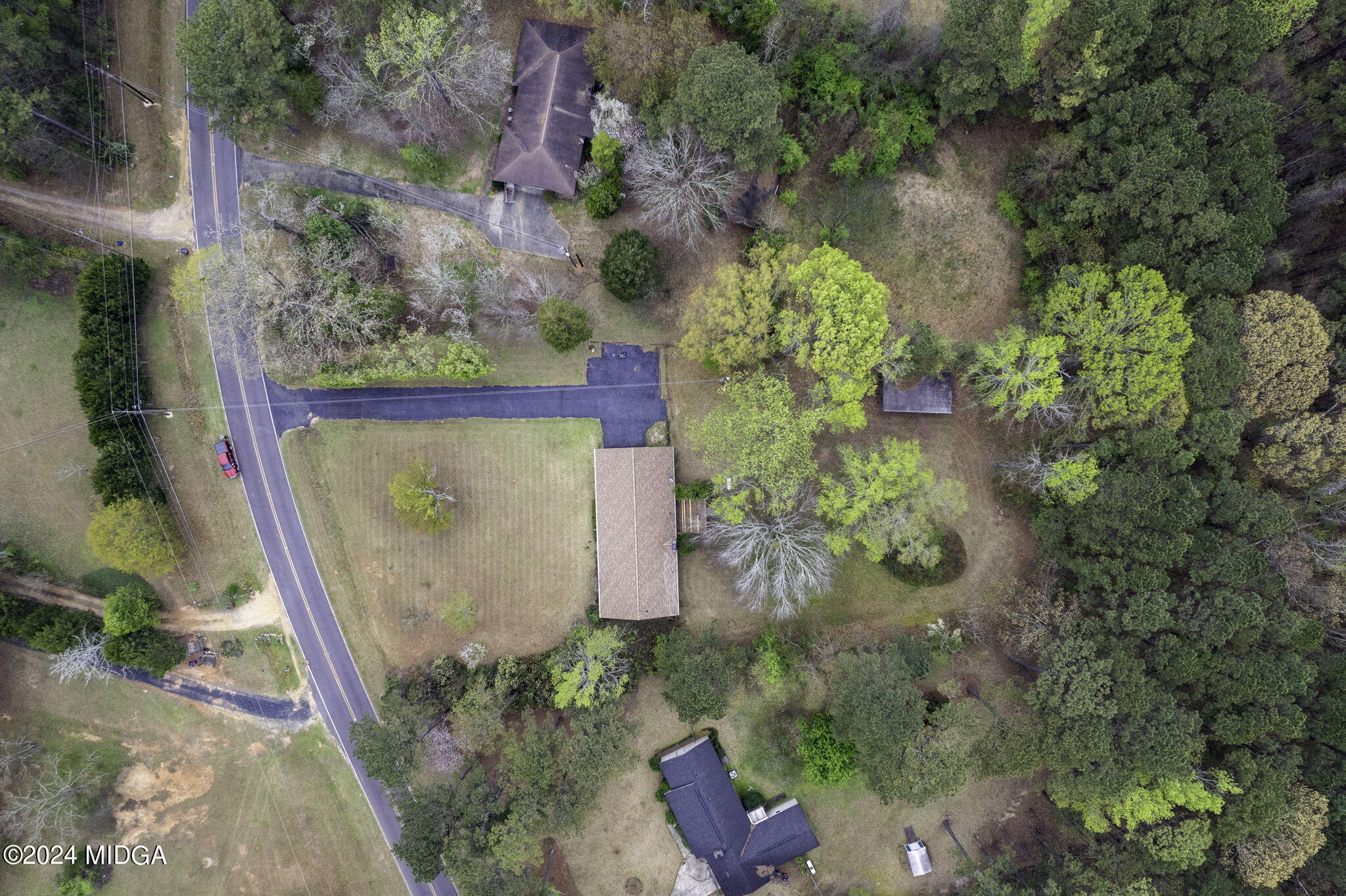 1299 Rainey Road Macon, GA 31220 - Photo 33 of 35 an aerial view of a house with a yard