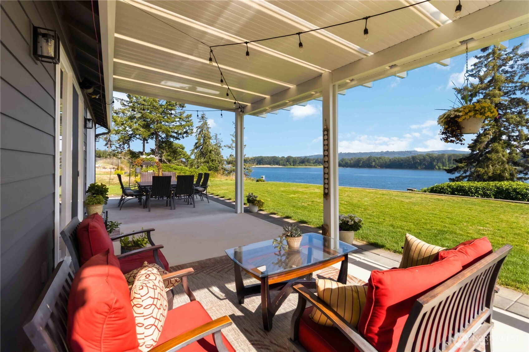119 Old Mill Creek Road Longview, WA 98632 - Photo 27 of 40 a view of a patio with a table chairs and a patio