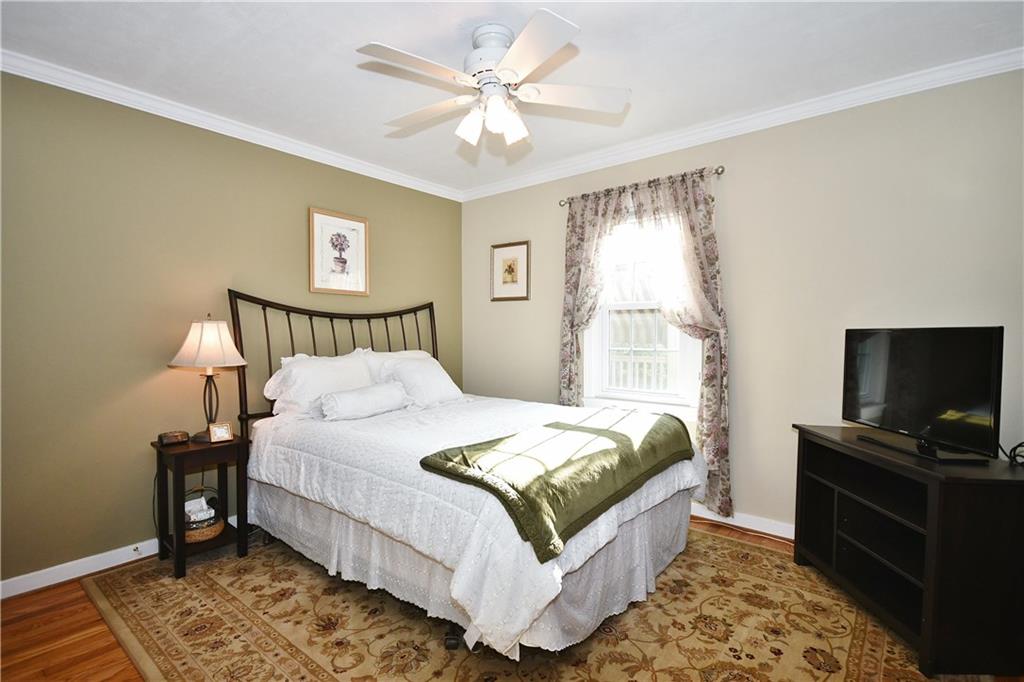 1260 Prospect Road Pittsburgh, PA 15227 - Photo 11 of 25 The first floor has a master bedroom with good closet space and a half bath ensuite. Of course, you could also use this as a den if needed.