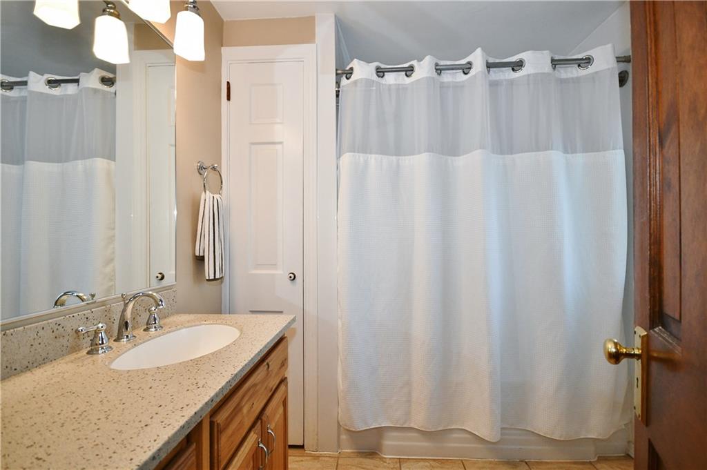 1260 Prospect Road Pittsburgh, PA 15227 - Photo 16 of 25 The full bath is a good size, has a linen closet and a window to let in some fresh air in the morning.