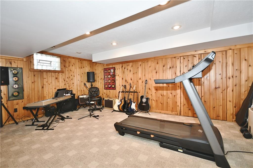 1260 Prospect Road Pittsburgh, PA 15227 - Photo 17 of 25 The lower level is exceptionally spacious! Here is an area you could use in many different ways - movie night, exercise room, man cave - the options are limitless!