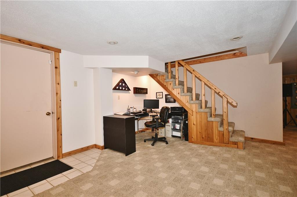1260 Prospect Road Pittsburgh, PA 15227 - Photo 18 of 25 Tucked under the stairs is an office area. The door to the left goes out to the garage.