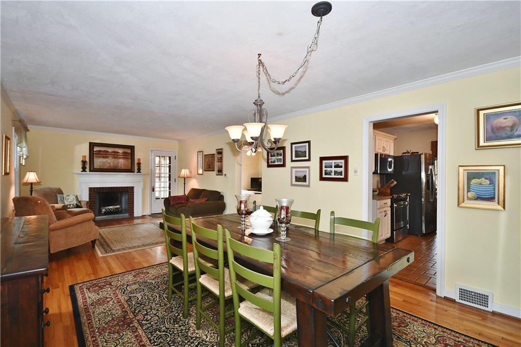 1260 Prospect Road Pittsburgh, PA 15227 - Photo 4 of 25 Here you can see the entire space and how convenient it is to the kitchen. PLUS, check out the gorgeous original hardwood floors here and throughout the home.