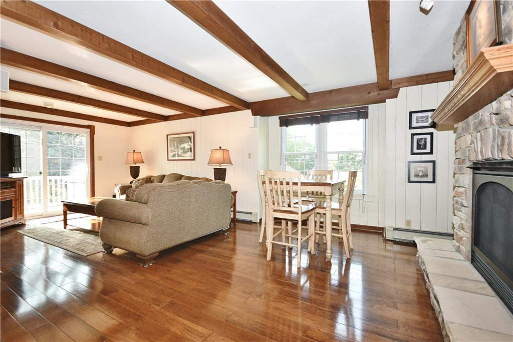 1260 Prospect Road Pittsburgh, PA 15227 - Photo 8 of 25 You are going to love this light and bright family room with stunning hardwoods! This addition goes across the entire rear of the house.