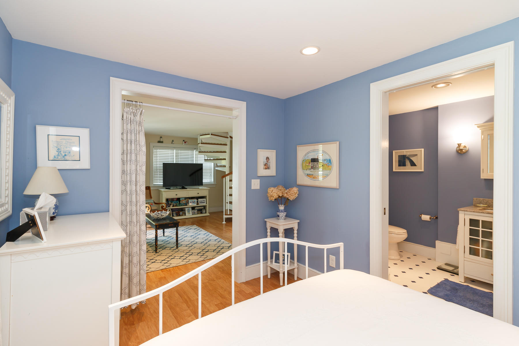 49 Old Shore Road Falmouth, MA 02540 - Photo 23 of 31 a bedroom with a bed and a view of living room