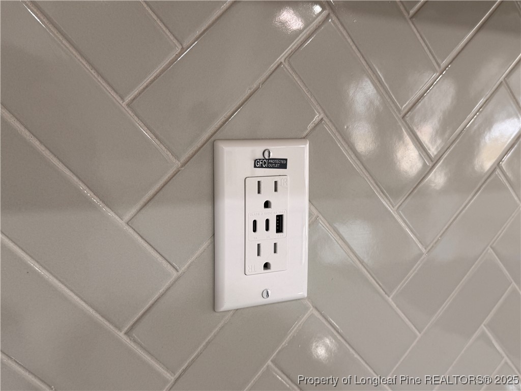 279 Elijah Way Vass, NC 28394 - Photo 19 of 36 a view of a hallway with windows