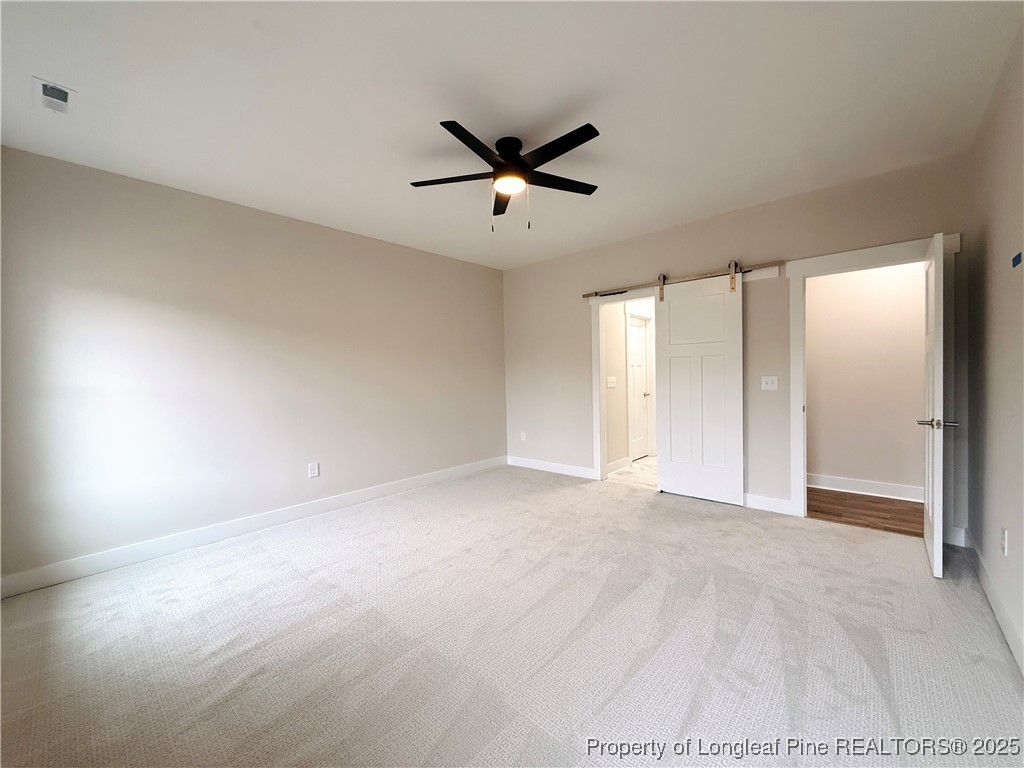 279 Elijah Way Vass, NC 28394 - Photo 21 of 36 a view of an empty room