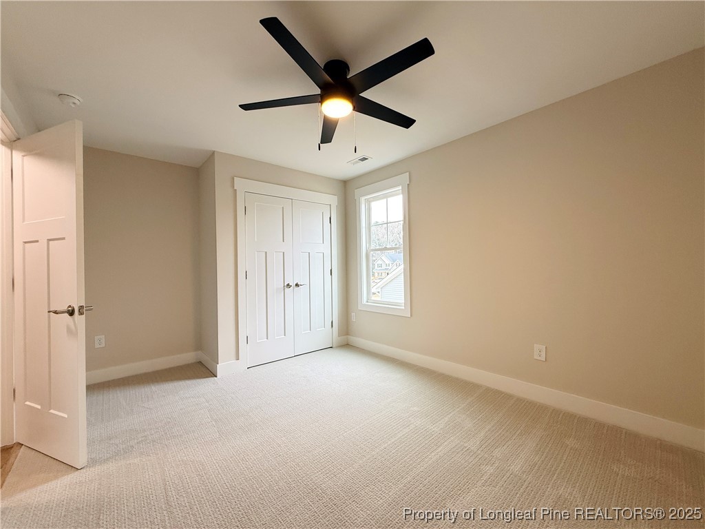 279 Elijah Way Vass, NC 28394 - Photo 27 of 36 a view of an empty room