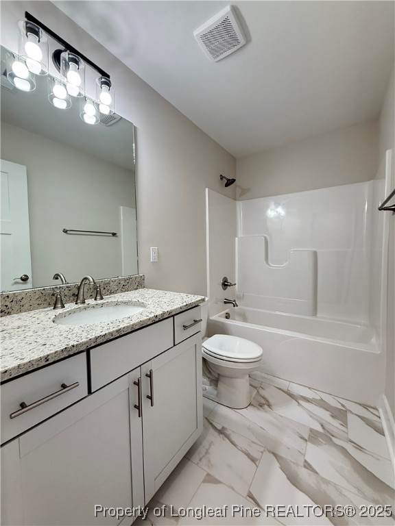 279 Elijah Way Vass, NC 28394 - Photo 30 of 36 a bathroom with a granite countertop toilet sink and mirror