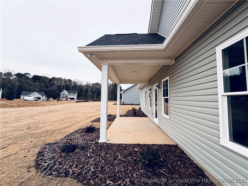 279 Elijah Way Vass, NC 28394 - Photo 36 of 36 a view of a house with a yard