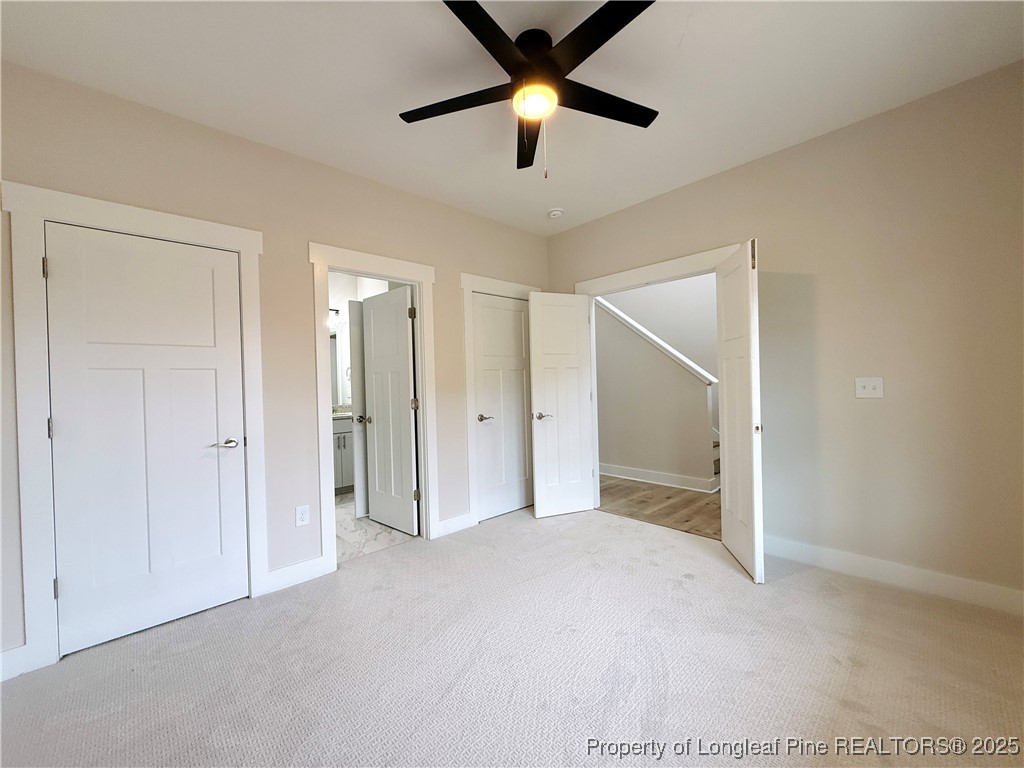 279 Elijah Way Vass, NC 28394 - Photo 7 of 36 a view of empty room with ceiling fan