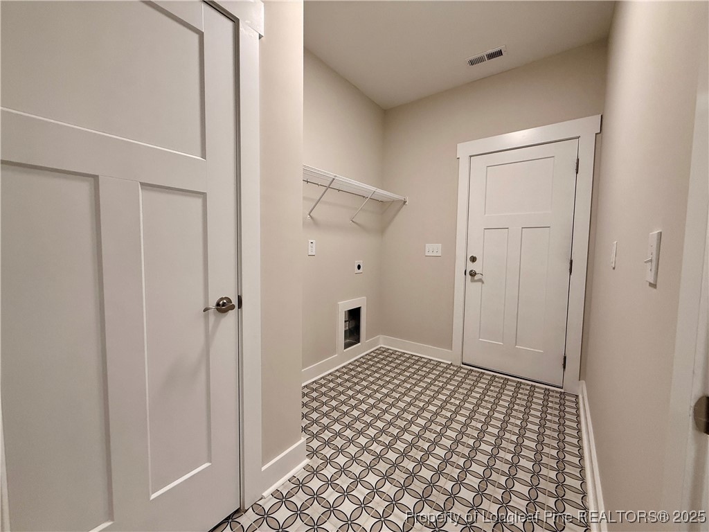 279 Elijah Way Vass, NC 28394 - Photo 10 of 36 a bathroom with a sink and a mirror