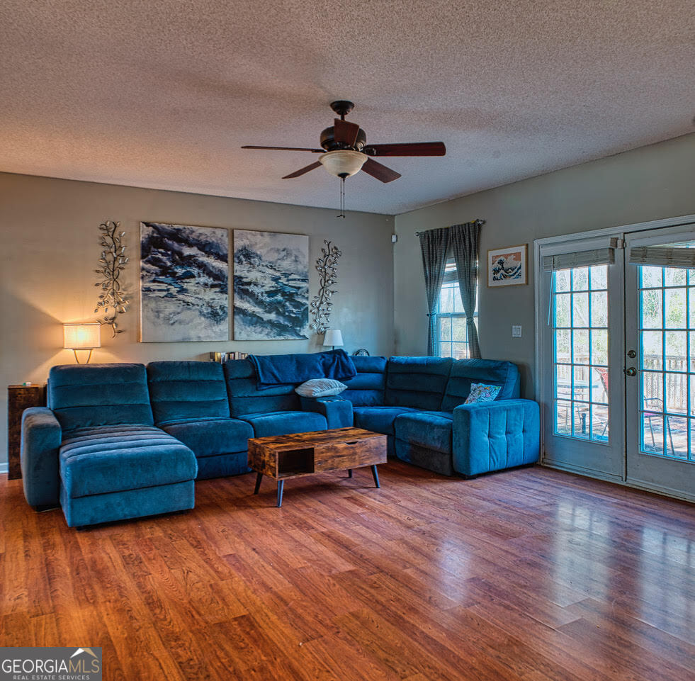 221 Pendleton Court Macon, GA 31216 - Photo 3 of 16 a living room with furniture and a large window