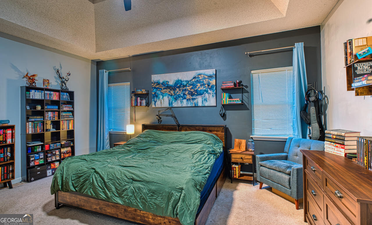 221 Pendleton Court Macon, GA 31216 - Photo 9 of 16 a bedroom with a bed and closet