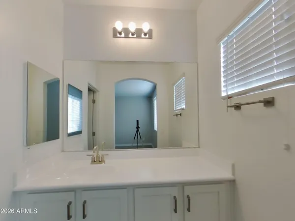 a bathroom with a shower and toilet