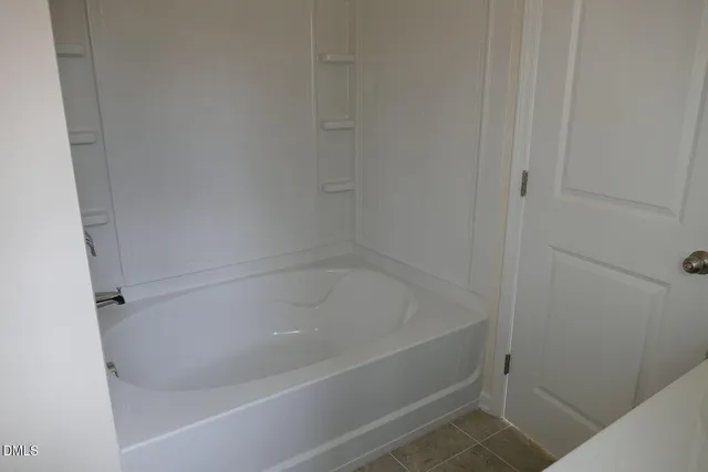 a close up of a bathtub