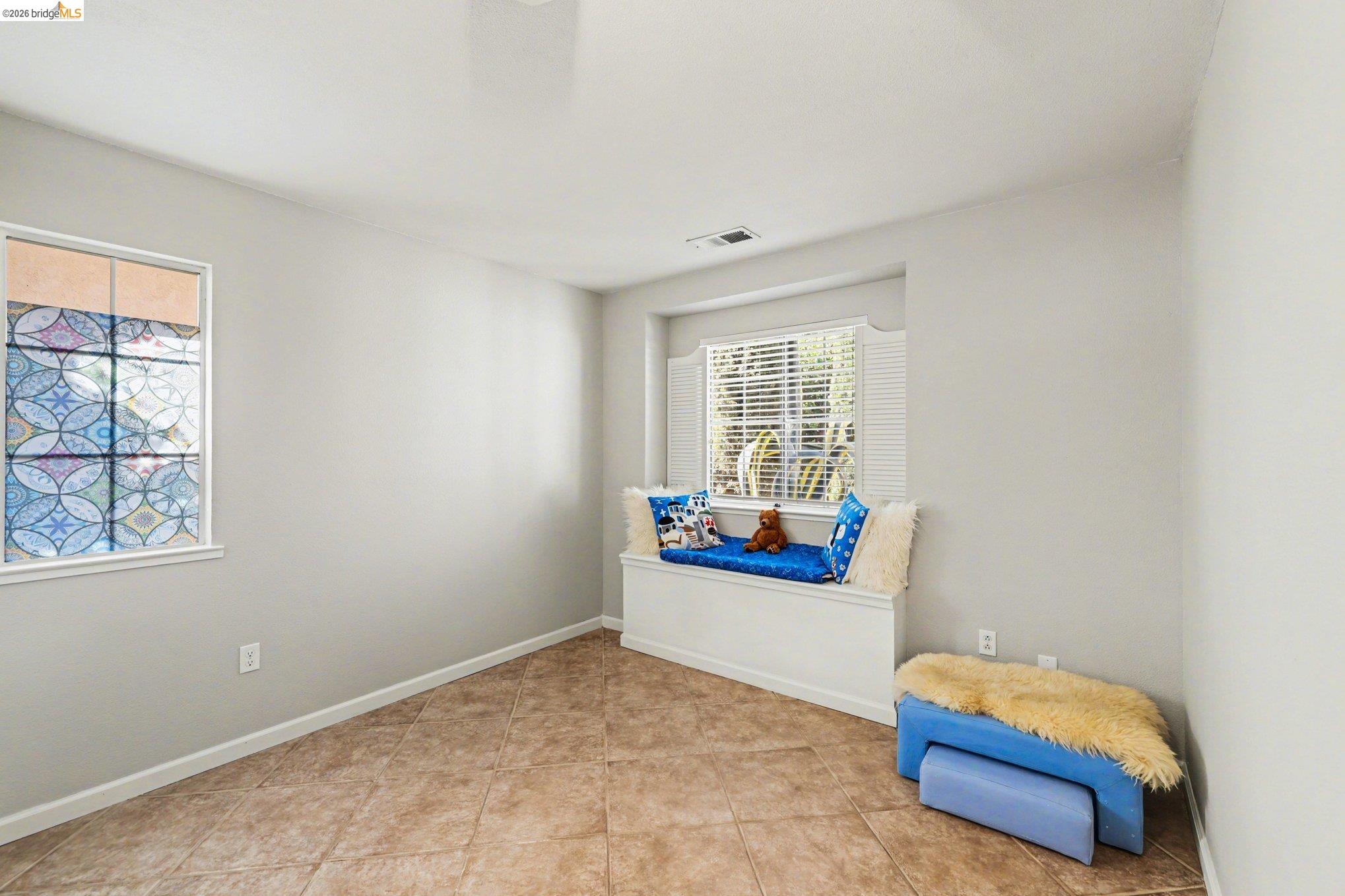 2701 Coffee Tree Way Antioch, CA 94509 - Photo 13 of 29 a living room with furniture and a window