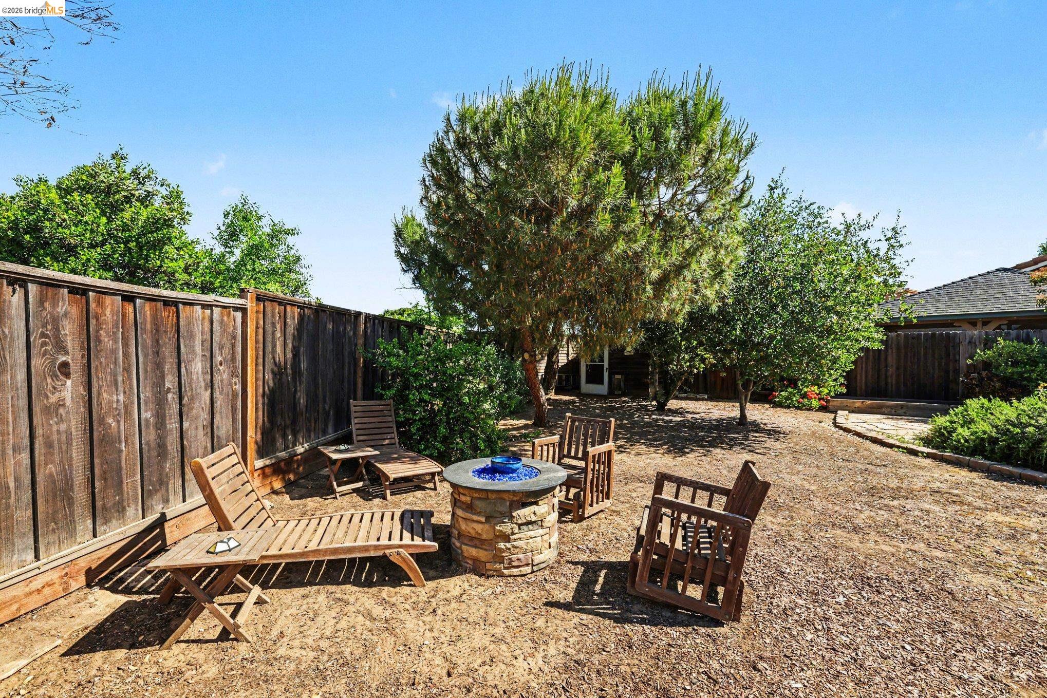 2701 Coffee Tree Way Antioch, CA 94509 - Photo 24 of 29 a view of a chairs and table in backyard