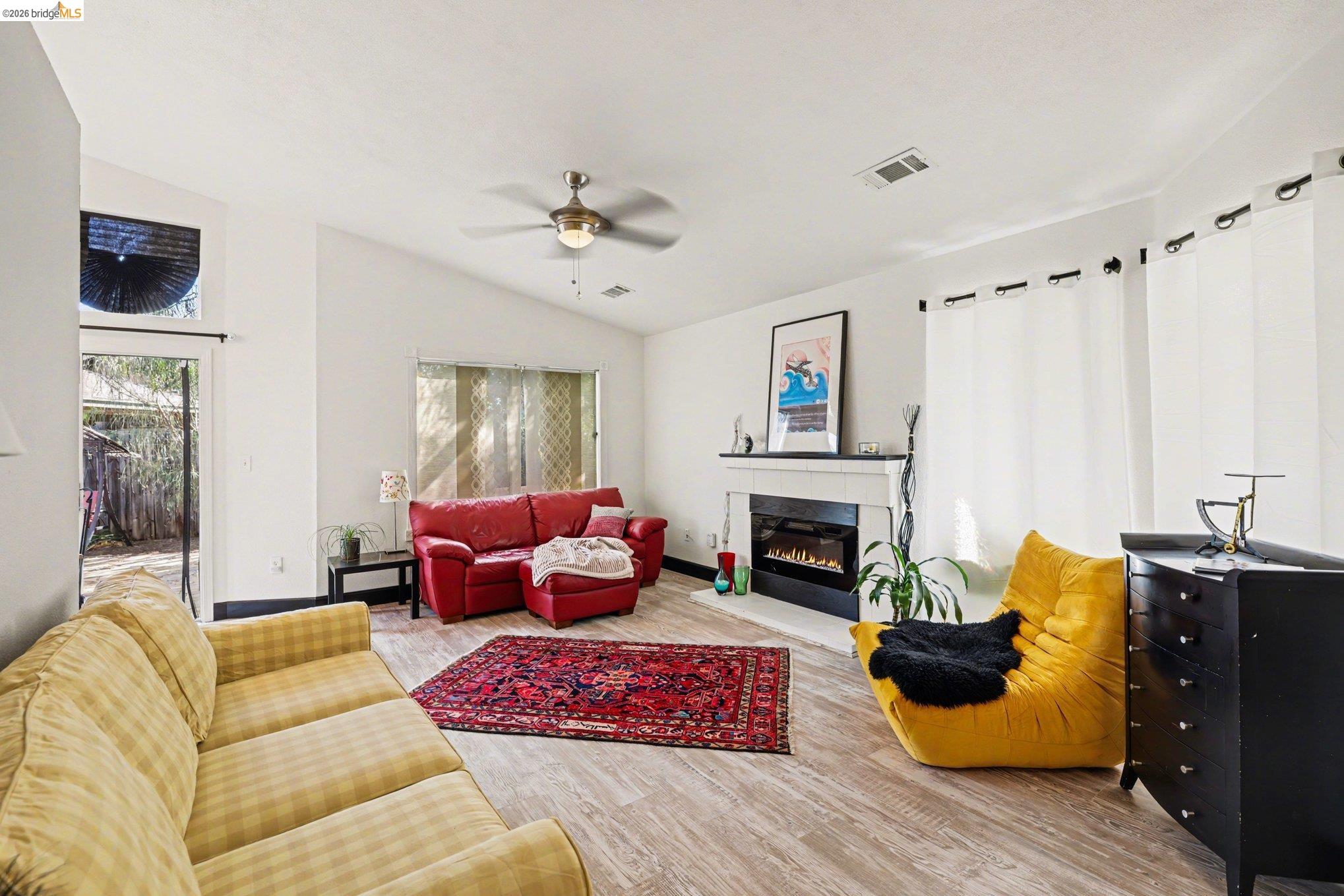 2701 Coffee Tree Way Antioch, CA 94509 - Photo 5 of 29 a living room with furniture fireplace and a window