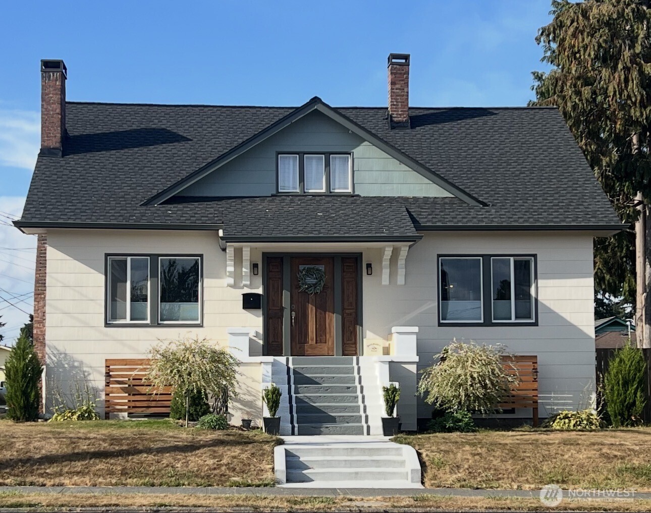 2811 19th Street Everett, WA 98201 - Photo 1 of 1 a front view of a house with garden